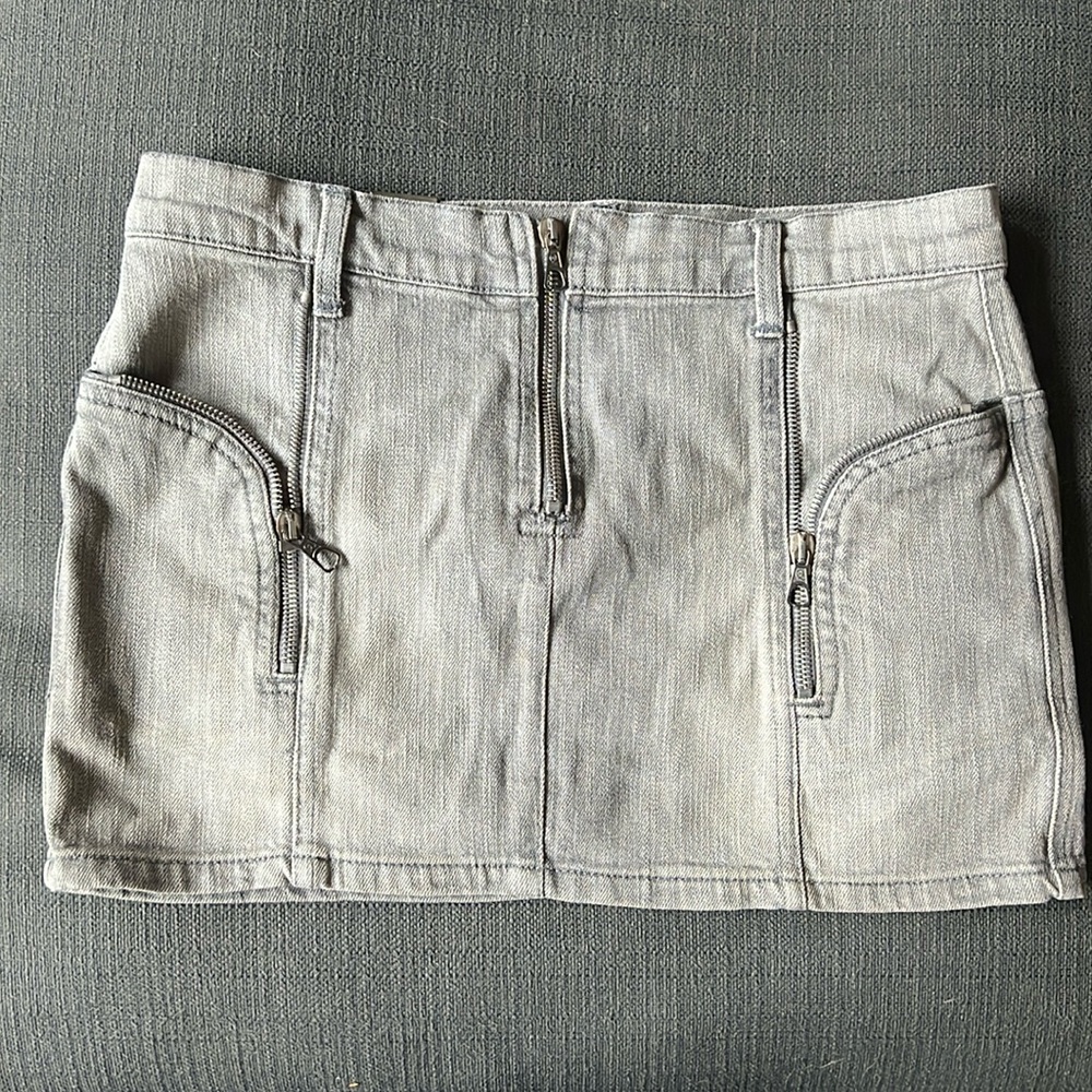 Alexander McQueen low waisted light gray denim super mini with zipper detail